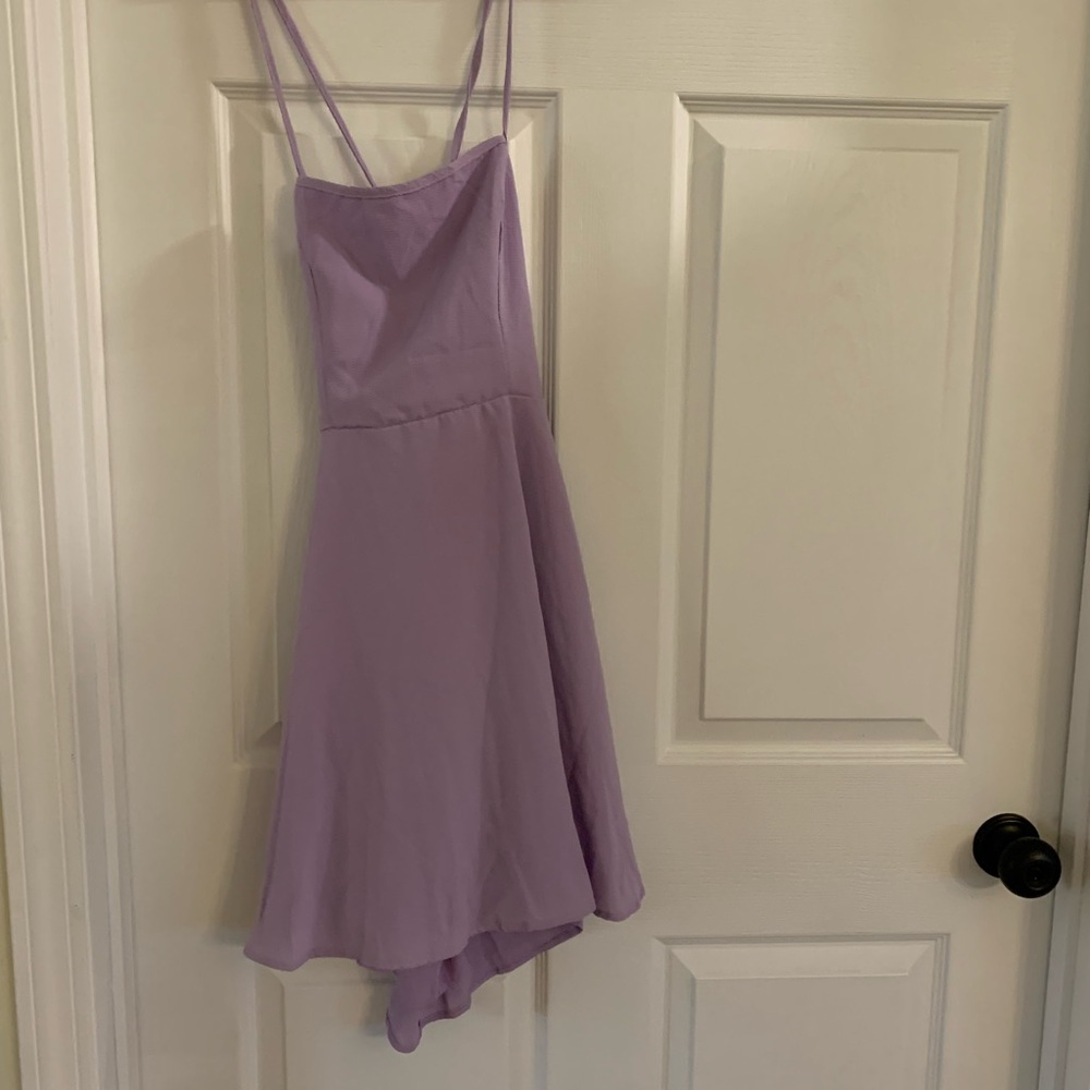 Purple backless cocktail dress.